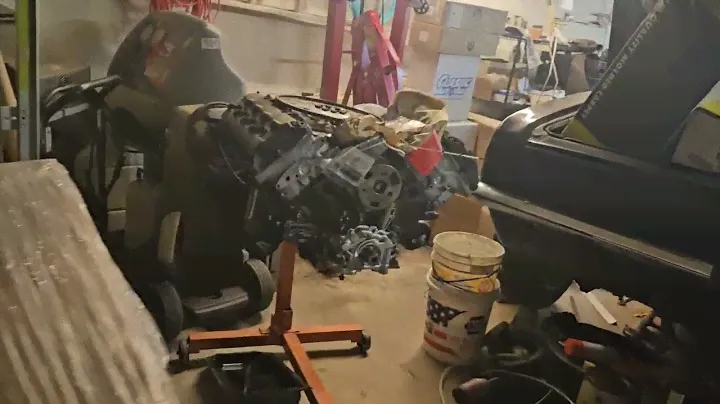 5.7L Hemi. Crank pulley and timing cover removal. and something encouraging.