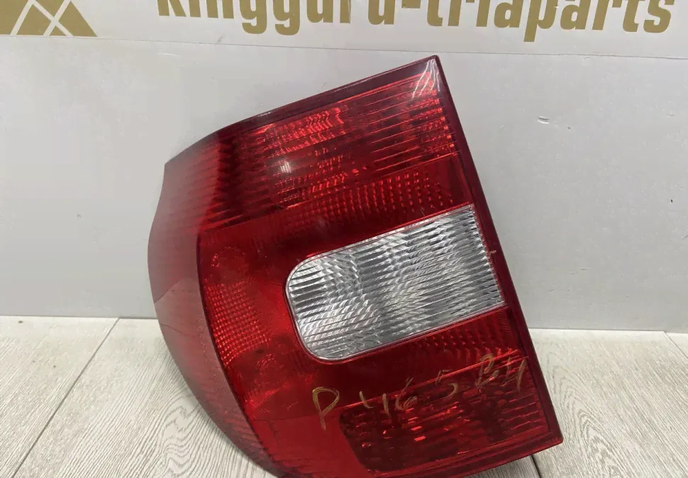 Фонарь левый Skoda Yeti до рестайлинг OEM 5L0945095-0
