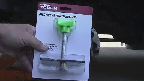 Disc brake pad spreader and how it works