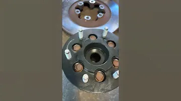 Replace wheel bearing or remove wheel bearing to replace front rotors