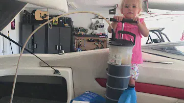 Oil change on the 5.0 Volvo Penta with my little helper Macie